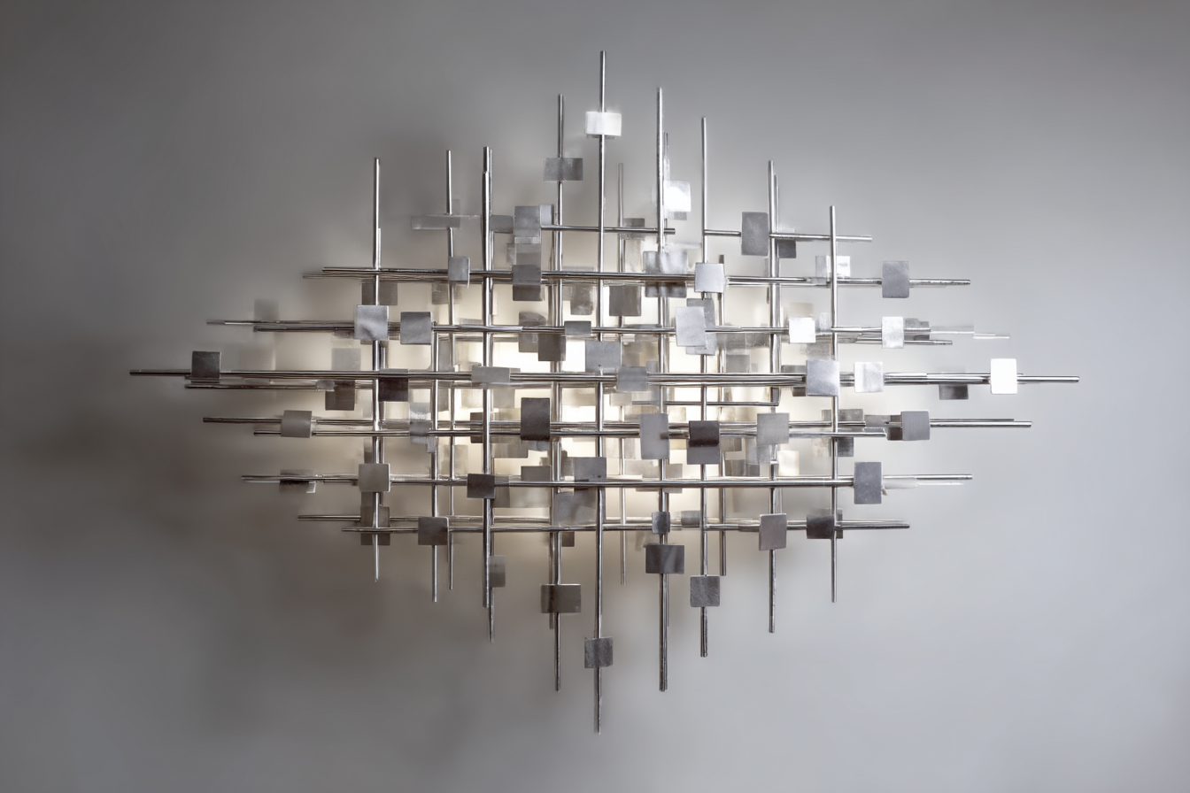 Polished stainless steel coffee table with clear glass top. Welded with high precision for both functional support and aesthetic refinement.